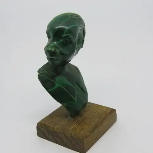 Malachite bust carving on wooden base