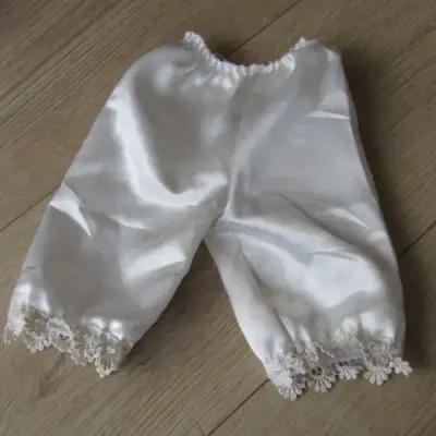 Lot of vintage doll clothing