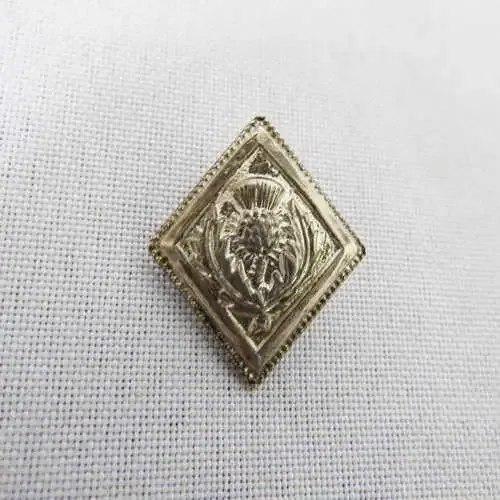 The Camarodians (The Scottish rifles) white metal button made by Wilkenson Sword company