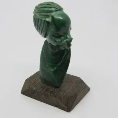 Malachite bust carving on wooden base