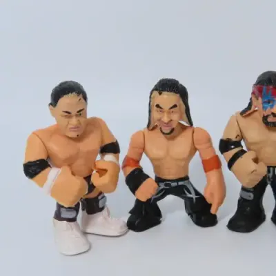 Lot of 4 WWE Rumblers figurines