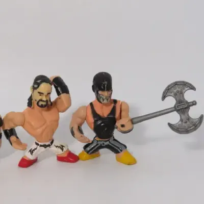 Lot of 4 WWE Rumblers figurines