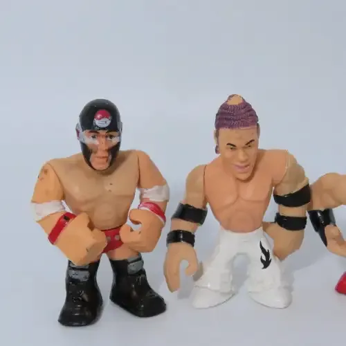 Lot of 4 WWE Rumblers figurines
