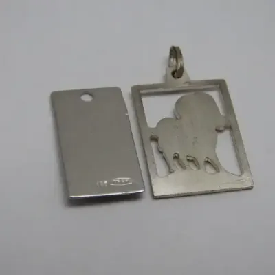 Pair of Aries Zodiac pendants - Both silver