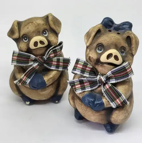 Pair of piggy salt and pepper pots
