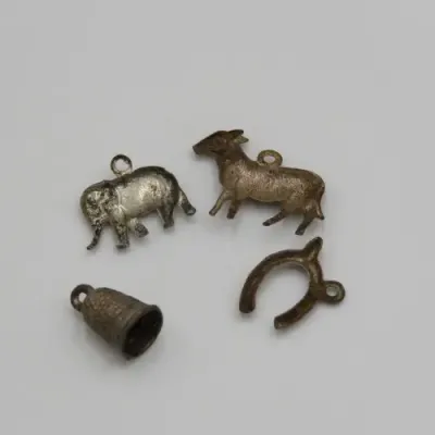 Lot of 4 antique Christmas pudding charms
