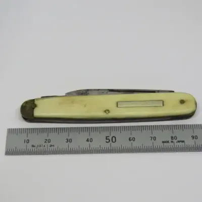 Vintage Potter 2 blade pocket knife with damaged bone handle