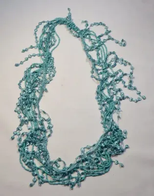 Blue bead and material necklace - 47 cm long