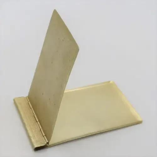 Vintage metal pocket book cover