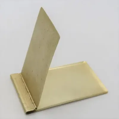 Vintage metal pocket book cover
