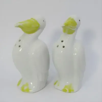 Pair of porcelain Pelican salt and pepper shakers