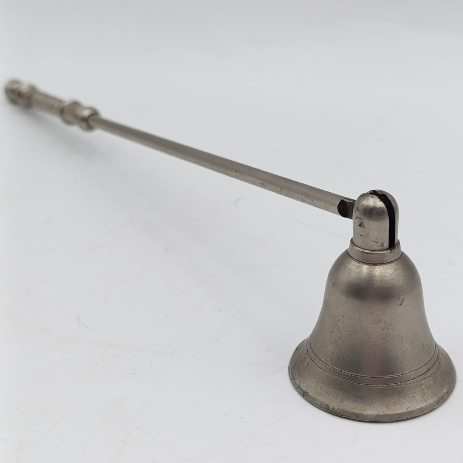 Vintage white brass candle snuffer