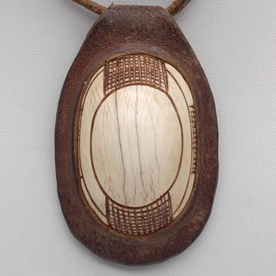Original Himbu Omakipa/Ekipa set in leather for traditional jewellery