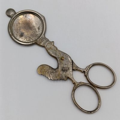 Vintage candle snuffer with rooster