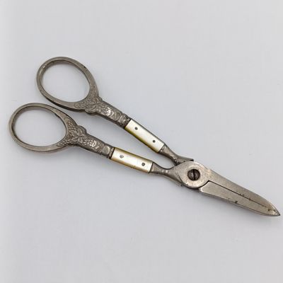 Vintage pair of grape scissors with mother of pearl inserts