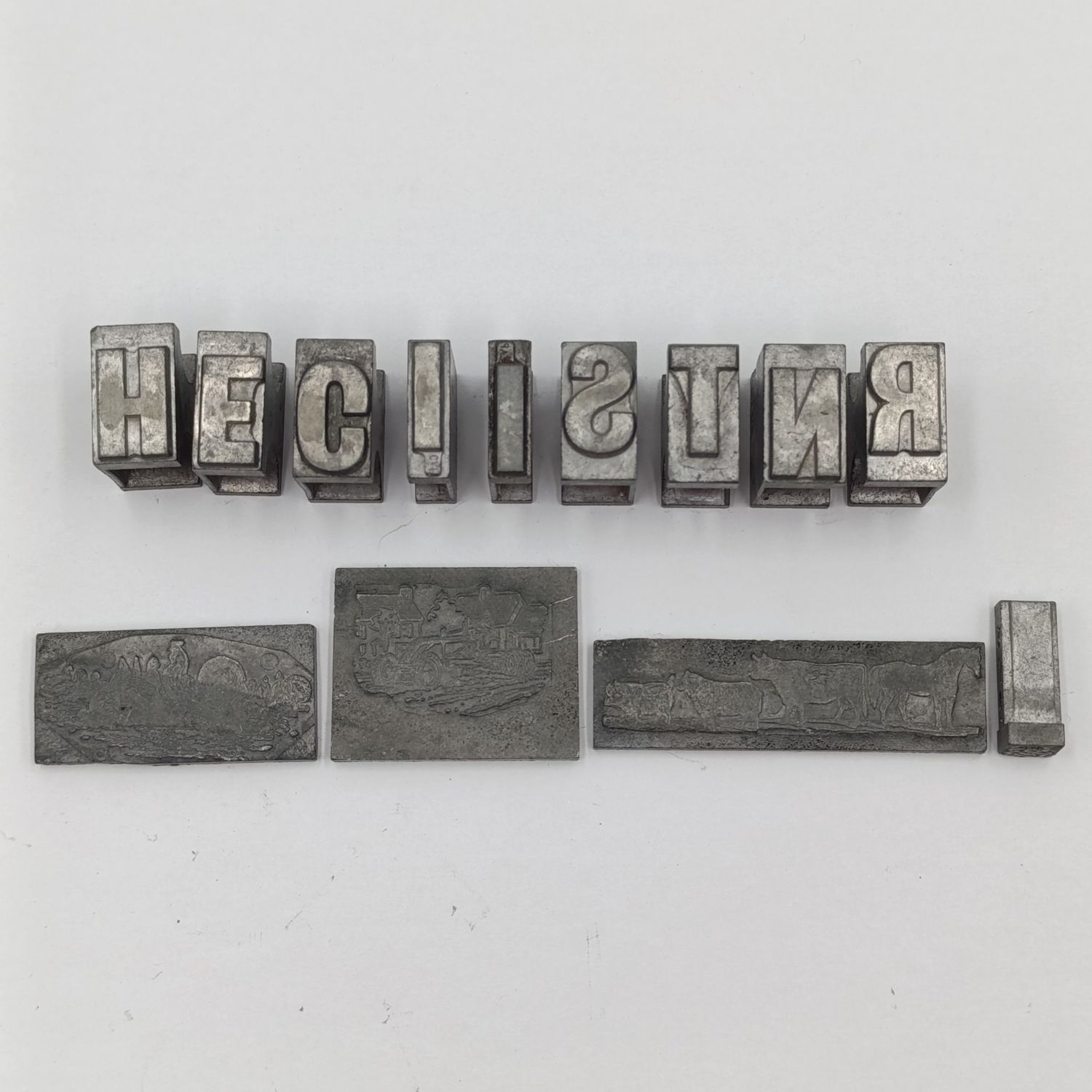 Lot of 13 metal letter and shape press block