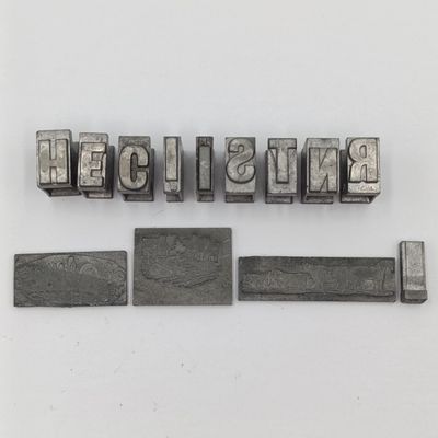 Lot of 13 metal letter and shape press block