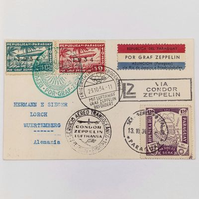 Attractive Zeppelin card with 1934 Paraguayan Franking - 3 paraguay stamps Graf zeppelin stamp and Condor Zeppelin Rubber cancellation - 3 other zeppelin postmarks - Paraguay to Germany