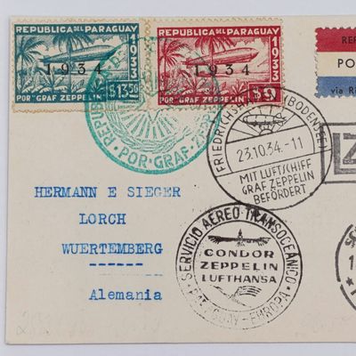 Attractive Zeppelin card with 1934 Paraguayan Franking - 3 paraguay stamps Graf zeppelin stamp and Condor Zeppelin Rubber cancellation - 3 other zeppelin postmarks - Paraguay to Germany