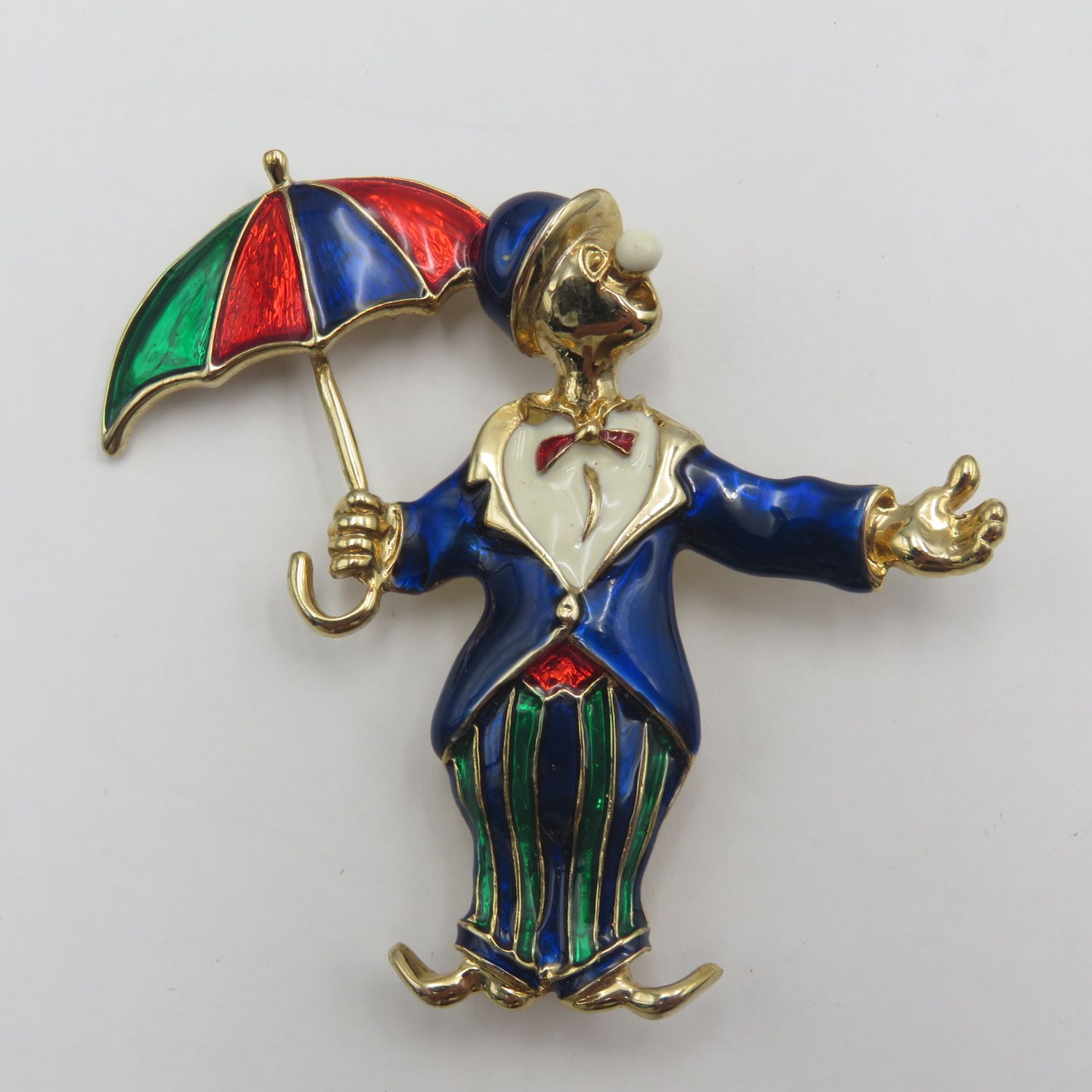 Vintage gold colour with enamel clown brooch
