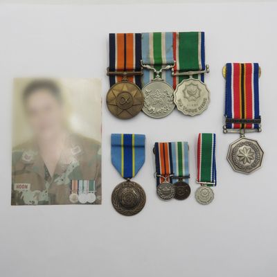 Set of 5 SA Army medals including UN peace medal and Tshumelo Ikatelaho with peace support clasp - Plus 3 miniatures and photo of female recipient - Sergeant Hoon