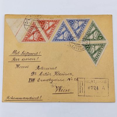 Postal Cover Riga, Latvia to Vienna, Austria with 6 triangular Latvian stamps cancelled 2 June 1928 Registration rubber stamp - Berlin and receiving backstamps