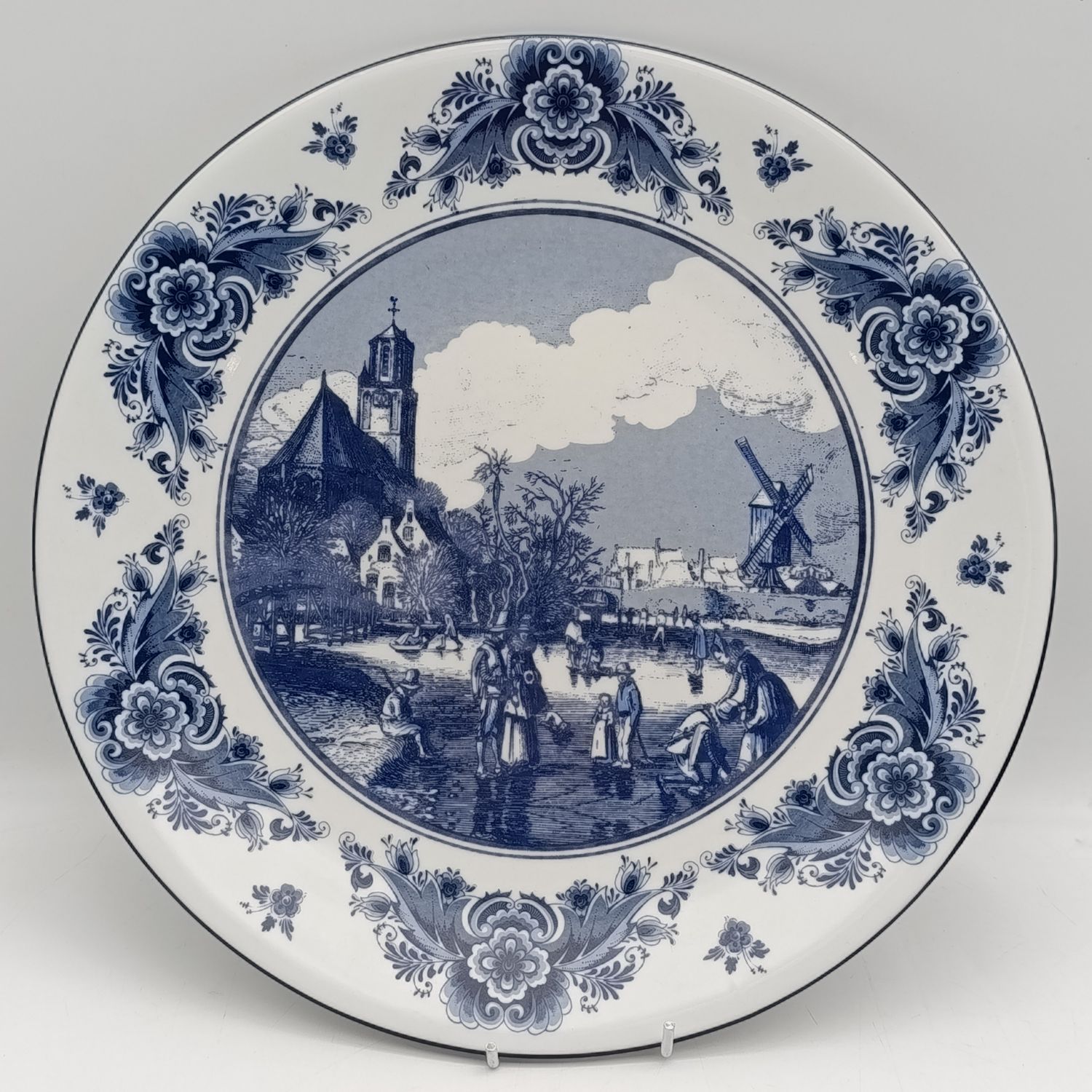 Vintage Delft Sunday winter scene on the frozen Delft canal porcelain plate