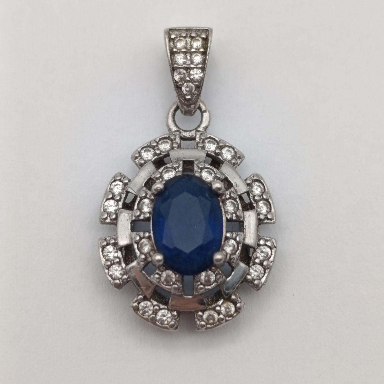 Sterling silver pendant with blue and clear stones - weighs 1.7g