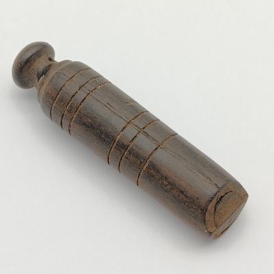Antique wooden police whistle