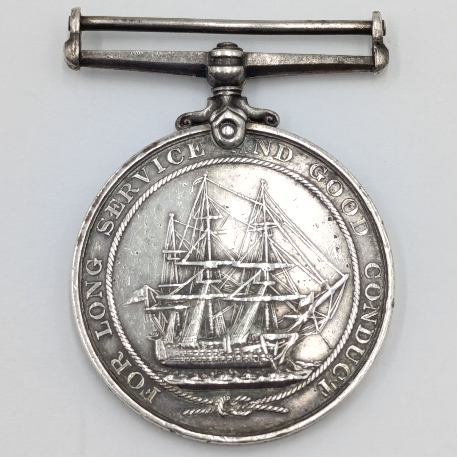 WW1 Royal Navy Long service and good conduct medal issued to 301828 E.C Tucker - Acting Chief Stoker on HMS King George V - no ribbon