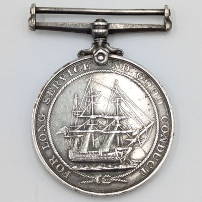 WW1 Royal Navy Long service and good conduct medal issued to 301828 E.C Tucker - Acting Chief Stoker on HMS King George V - no ribbon