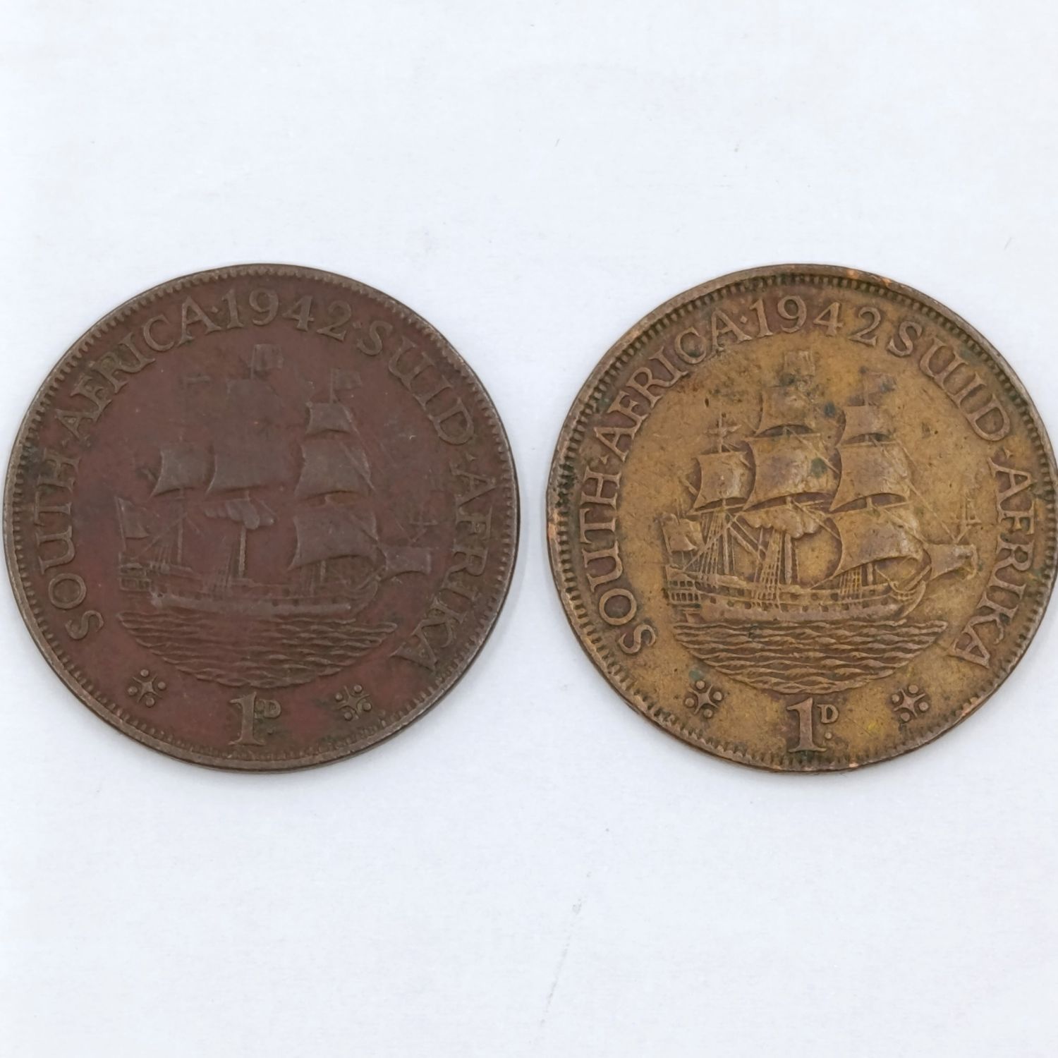 South Africa 1942 pennies with and without dot behind 2