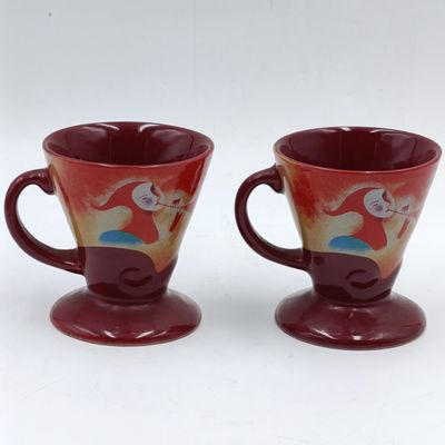 Pair of signed Linda Frichtel Jester coffee cups