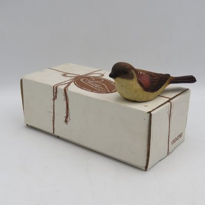 Feathers Cape White eye figurine in box