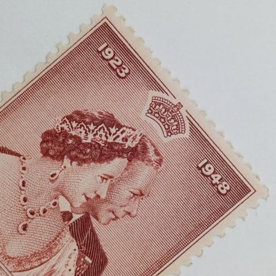 Northern Rhodesia SACC 49 Silver Wedding 20 shilling stamp - claret line from H of Northern to E of Rhodesia