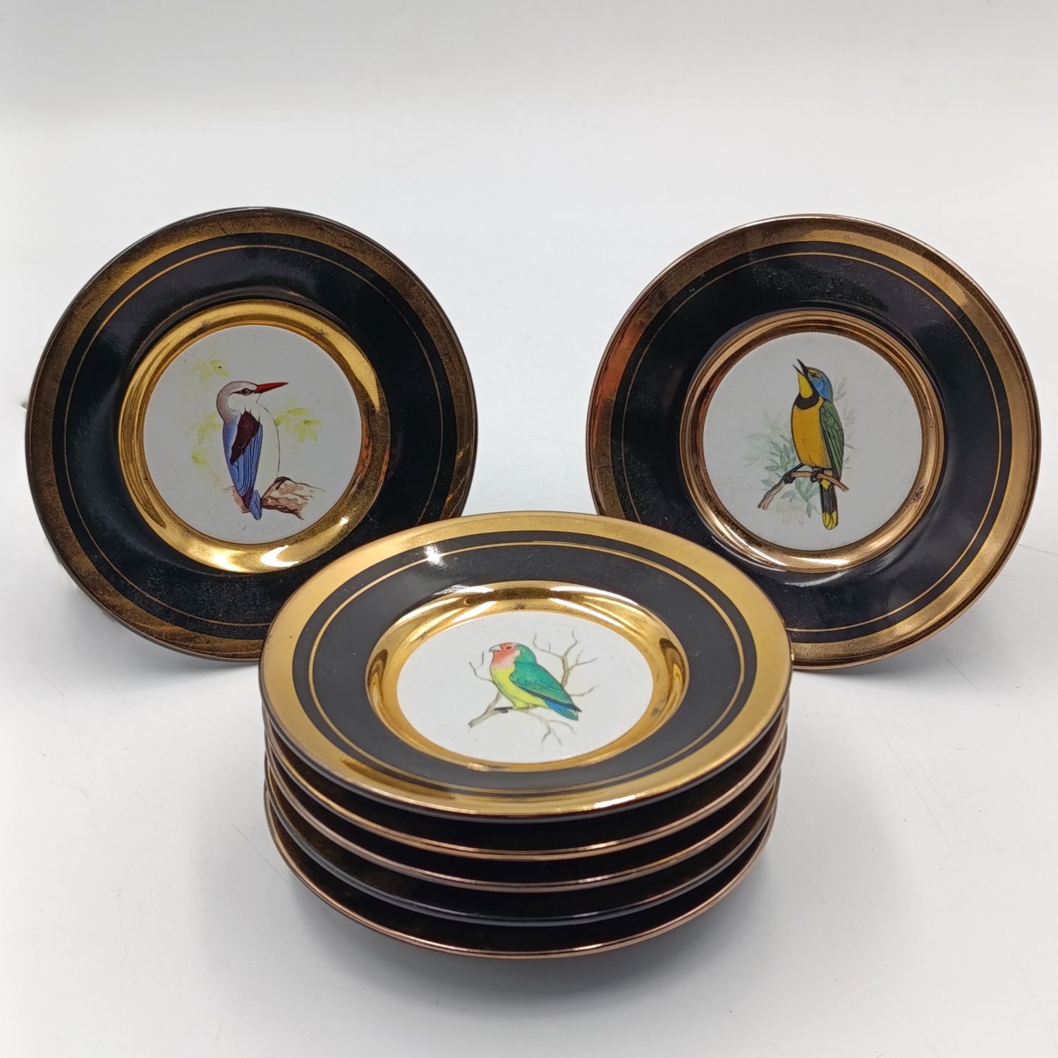 Set of 7 Gilding and enamel mini porcelain plates with birds