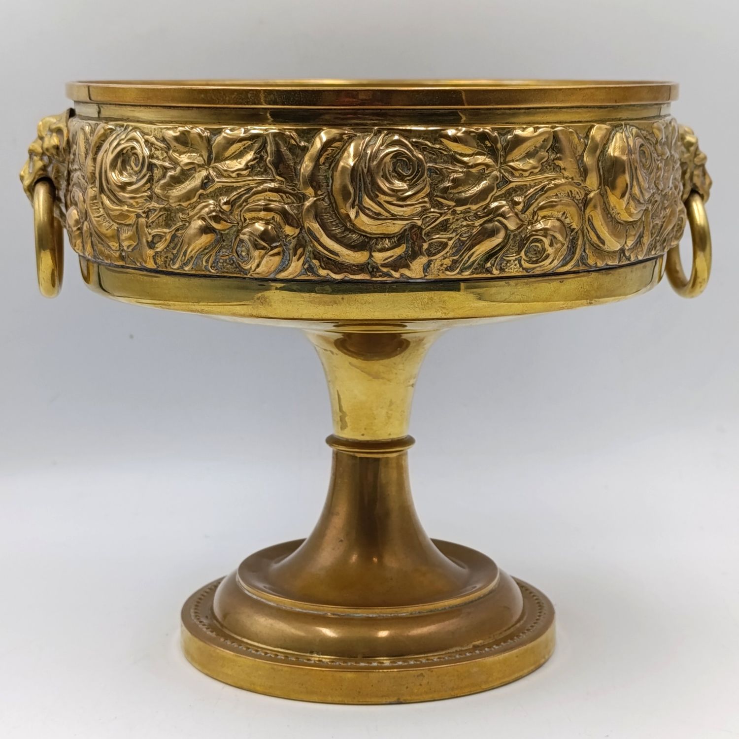 Vintage brass fruit bowl with brass lion head handles