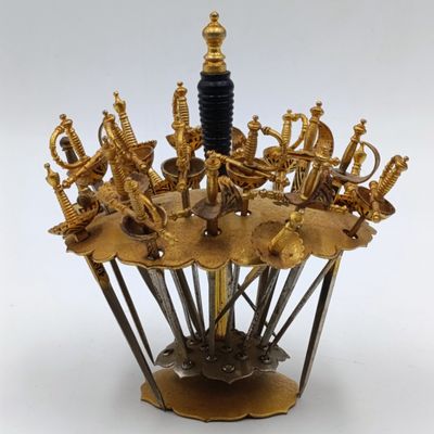 Vintage Toledo fondue sword set with only 20 of the 24 swords