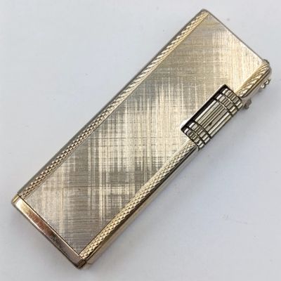 Vintage Ruslite pocket lighter - working