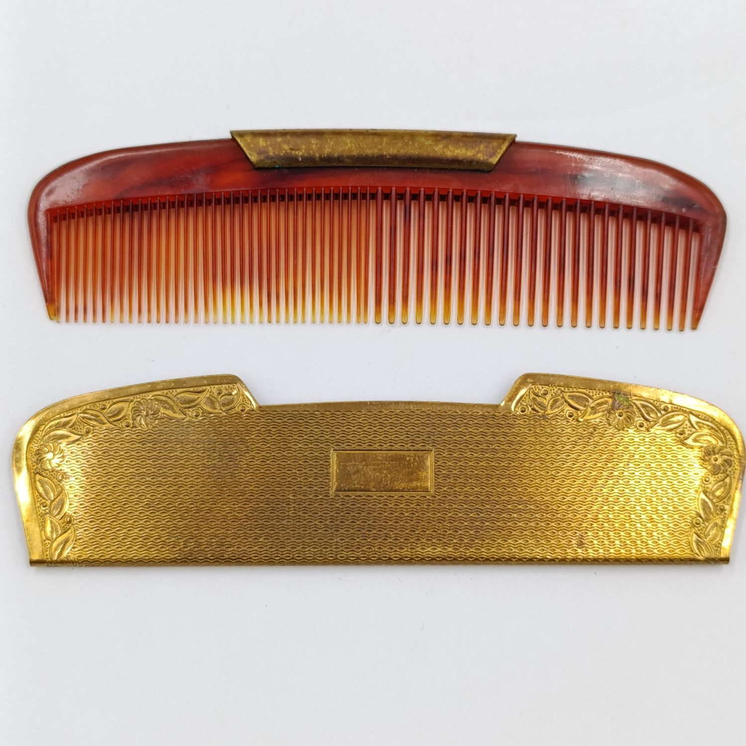 Antique pocket comb with brass case