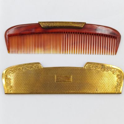 Antique pocket comb with brass case