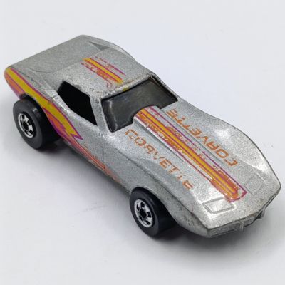Vintage metalic-silver Hot Wheels Chevrolet Corvette die-cast toy car