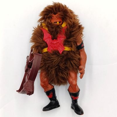 Vintage Masters of the Universe Grizzlor action figurine with weapon