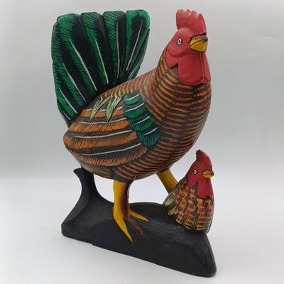 Beautiful wooden carved rooster with chick