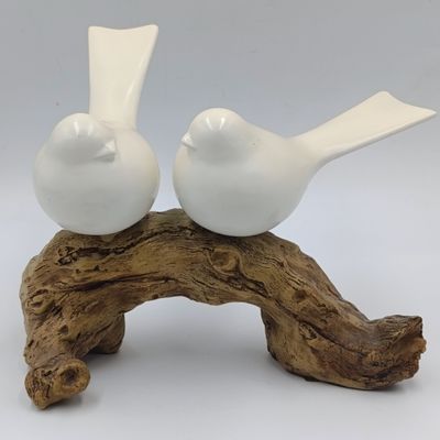 Beautiful birds on log figurine - polyresin