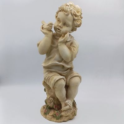 Beautiful little boy and bird resin sculpture - Height 40cm