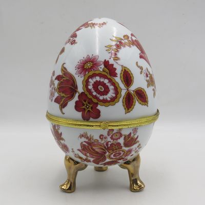 Vintage Hinged porcelain Jewellery / trinket egg on legs