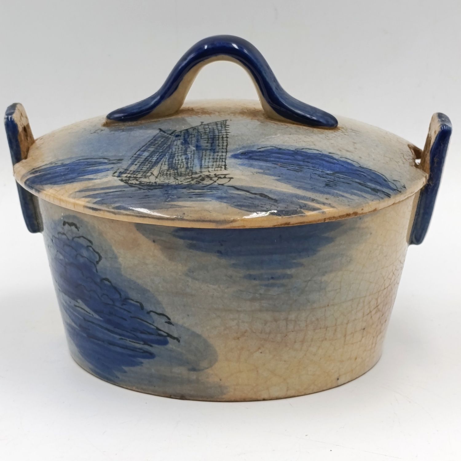 Antique blue and white pottery dish with lid