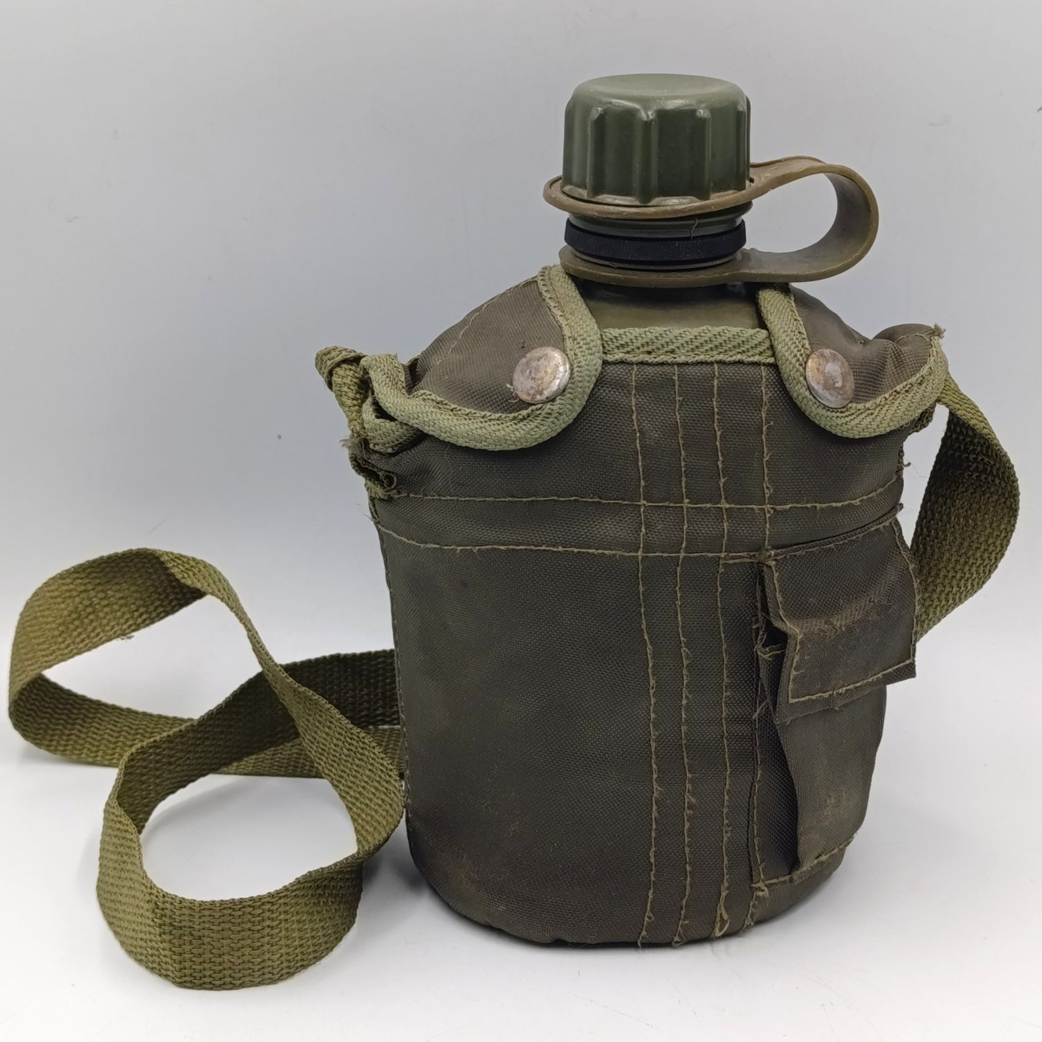 SADF water bottle with lid and firebucket in green material pouch and sling
