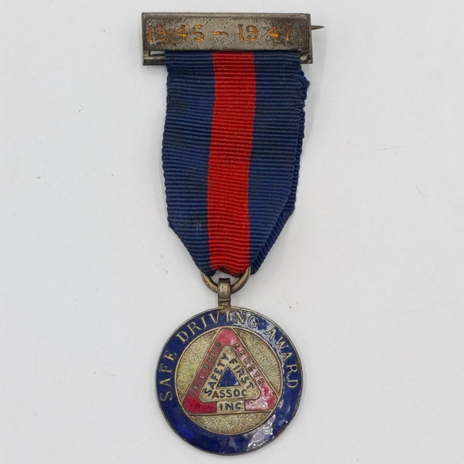 1945-1947 Safe Driving Award medal issued to TD 1150 J. Lutley